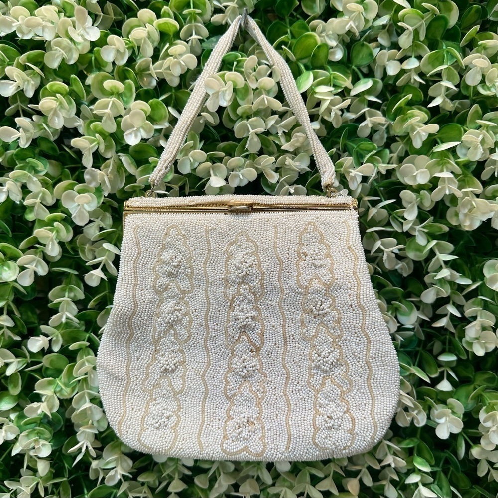 Vintage cream colored beaded clutch wristlet with small hand strap